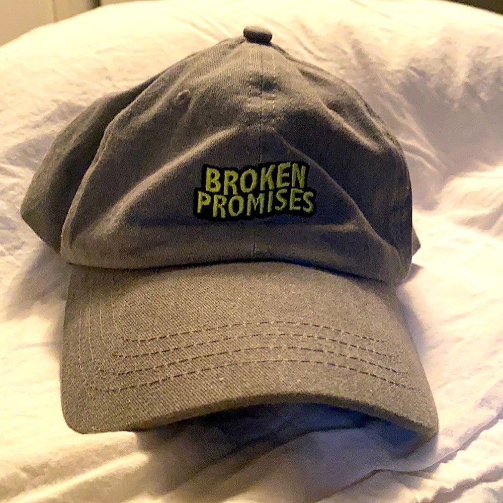 Gently used men’s cap, gray with embroidered logo